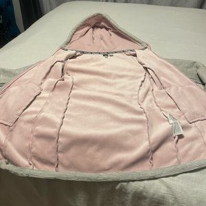 Grey Bench zip up hoodieLight grey on the outside with a pink lining.